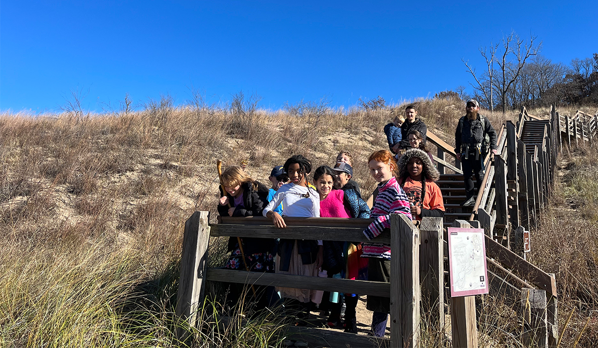 Student on the board walk at the Dunes National Park